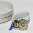 Taça e duas argolas de guardanapo