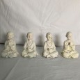 Conjunto de quatro monges budistas