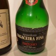 Duas Garrafas de Aguardente e Bagaceira