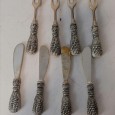 Quatro garfos e facas de aperitivo 