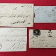 Quatro cartas tendo duas com selos tirados
