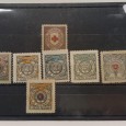 Carteira com 7 selos da Sociedade Geográfica