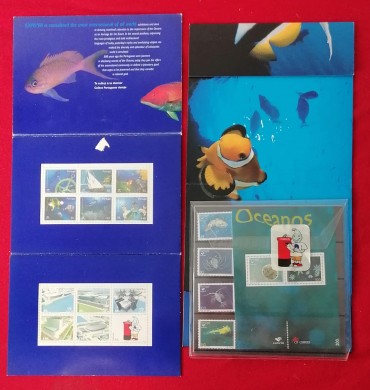 Um caderno de selos dos Oceanos + mini carteira Expo 98; todos com selos