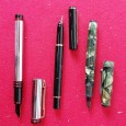 Três canetas de aparo 