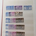 Álbum com selos novos ingleses mais conjunto de boas taxas de selos portugueses usados 