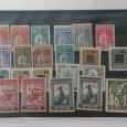 2 carteiras com selos das colónias em especial da Índia