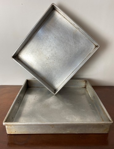 Dois tabuleiros de ir ao forno Marcados 