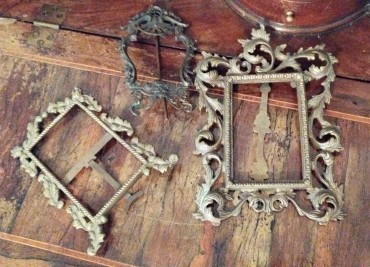 Três porta retratos 