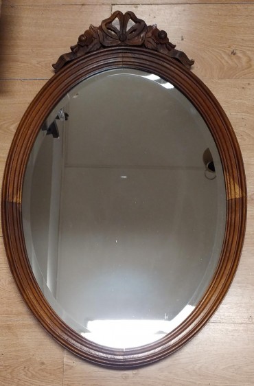 Espelho oval com laça 