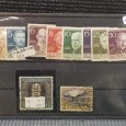 Carteira com selos de Berlim e Austria