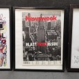 Três capas de revista emolduradas