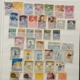 Classificador com cerca de 900 selos usados das ex-colónias (Timor, India, etc.)