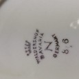 Seis chávenas de café com pires 
