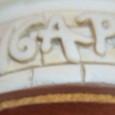 Estátua de cabeça de leão e rabo de peixe