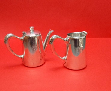 Leiteira e cafeteira em Christofle