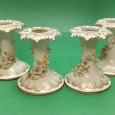Quatro castiçais porcelana