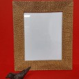 Moldura em pele e castiçal