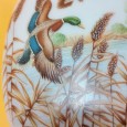 Castiçal e garrafa de bolso