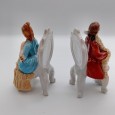 Par de figuras burguesas