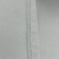 Lençol com malmequeres bordados