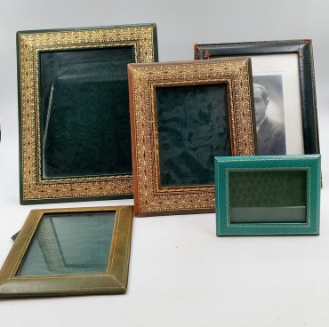 Cinco molduras em pele